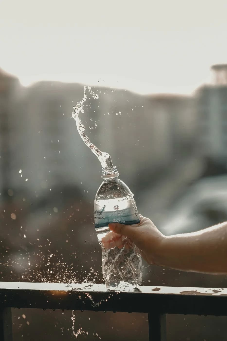 Water being poured into a drinking glass