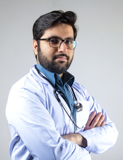 Care provider with glasses and a stethoscope