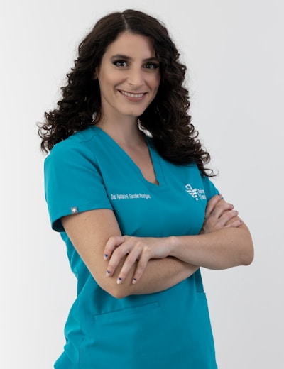 Care provider in teal scrubs